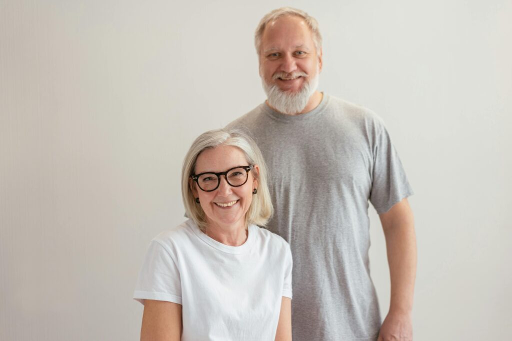 Cheerful middle-aged couple representing warmth, companionship, and peptide research connection.